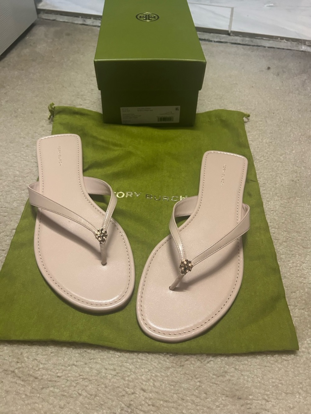 TORY BURCH classic leather flip flops.